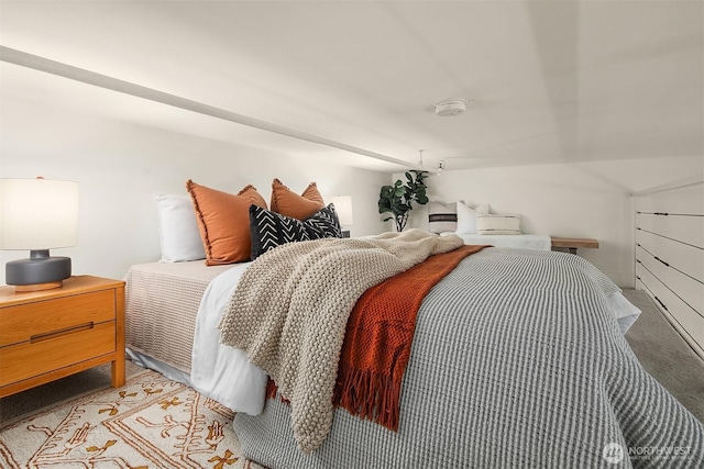 bedroom with light colored carpet