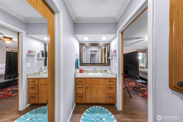 801 Bender Pl, Lynden, WA 98264 - ensuite bathroom with vanity, wood finished floors, ornamental molding, and baseboards
