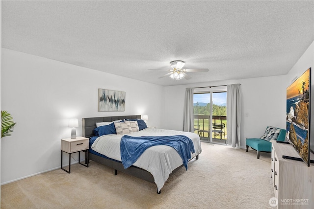 9320 96th St NE, Arlington, WA 98223 - bedroom featuring access to outside, carpet, a textured ceiling, ceiling fan, and baseboards