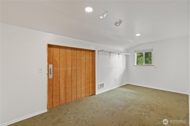 9320 96th St NE, Arlington, WA 98223 - carpeted spare room with vaulted ceiling, baseboards, and recessed lighting