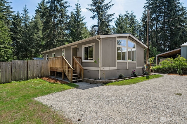 manufactured / mobile home featuring crawl space and a wooden deck