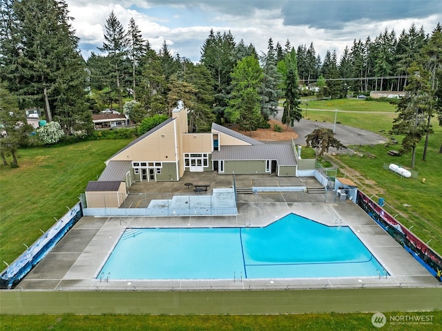 community pool featuring a patio area