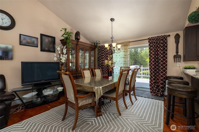 2809 E Sunset, Bellingham, WA 98226 - dining room featuring lofted ceiling, a chandelier, and wood finished floors