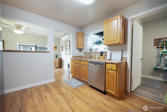213 N Division, Elma, WA 98541 - kitchen with dishwasher, light wood finished floors, a wall mounted air conditioner, and baseboards