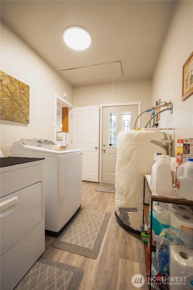 213 N Division, Elma, WA 98541 - laundry area featuring washing machine and clothes dryer, wood finished floors, and attic access