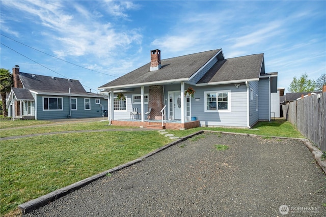 213 N Division, Elma, WA 98541 - view of front of property featuring covered porch and a chimney