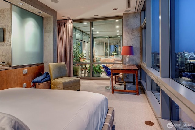 715 2nd Ave Unit 1801, Seattle, WA 98104 - bedroom featuring expansive windows, recessed lighting, and carpet flooring