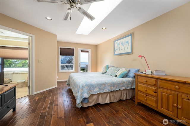 987 NW Camano Dr, Camano Island, WA 98282 - bedroom with multiple windows, dark wood-type flooring, recessed lighting, a ceiling fan, and baseboards
