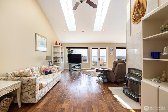 987 NW Camano Dr, Camano Island, WA 98282 - living area featuring a ceiling fan, dark wood-style flooring, a skylight, high vaulted ceiling, and recessed lighting