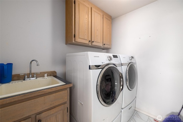 987 NW Camano Dr, Camano Island, WA 98282 - clothes washing area with independent washer and dryer and cabinet space