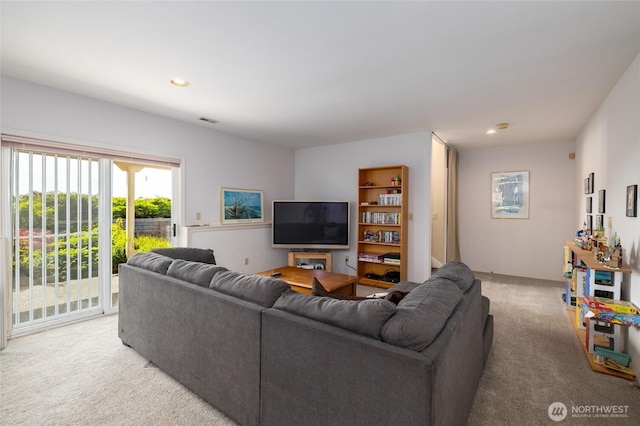 987 NW Camano Dr, Camano Island, WA 98282 - living area featuring light carpet, healthy amount of natural light, and recessed lighting