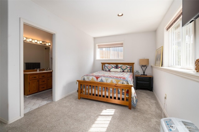 987 NW Camano Dr, Camano Island, WA 98282 - carpeted bedroom with connected bathroom and baseboards
