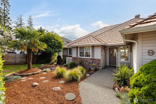 987 NW Camano Dr, Camano Island, WA 98282 - doorway to property with fence and brick siding