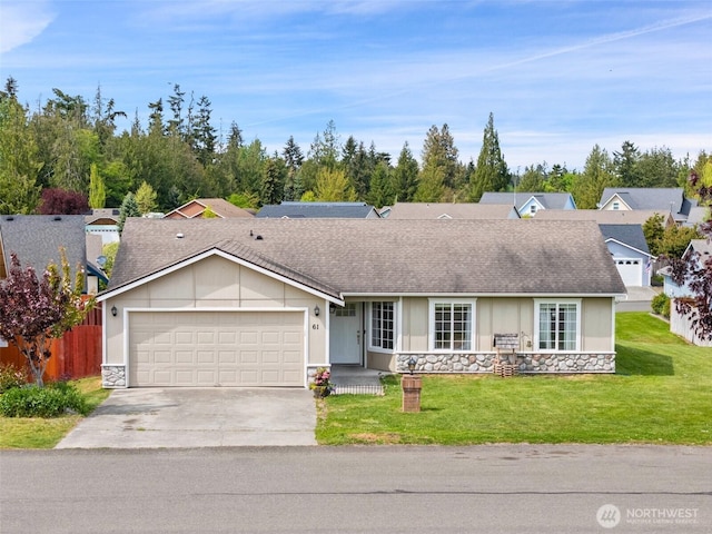61 Patriot Way, Sequim, WA 98382 - ranch-style house with stone siding, driveway, an attached garage, and a shingled roof