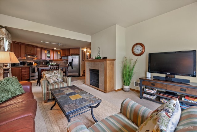 7806 Birch Bay Dr Unit 515, Blaine, WA 98230 - living area with light carpet, a fireplace, and baseboards