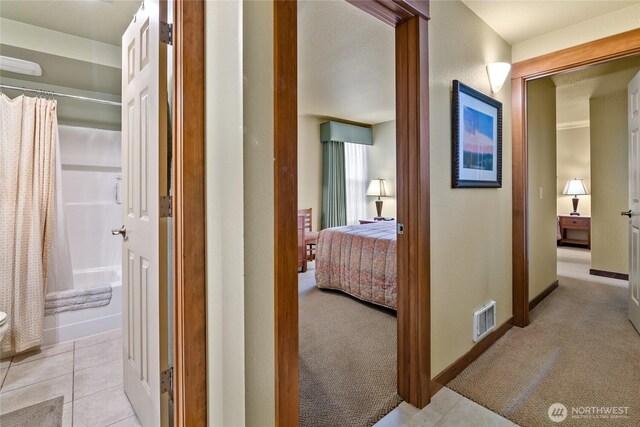 7806 Birch Bay Dr Unit 515, Blaine, WA 98230 - corridor with baseboards and light carpet