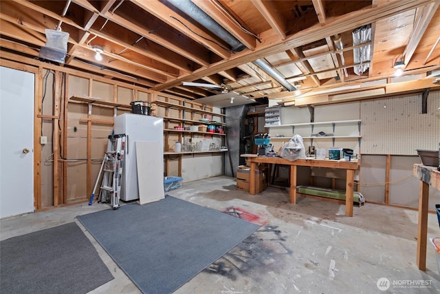 5207 NW Painted Hills Rd, Ephrata, WA 98823 - unfinished basement featuring a workshop area