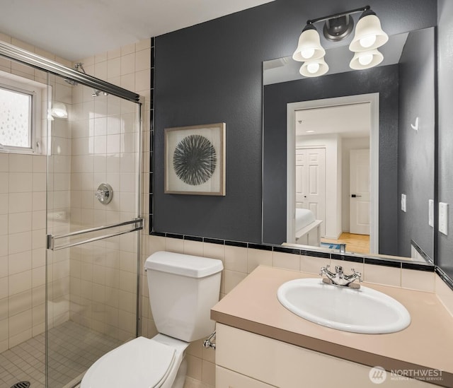 1416 6th Ave N, Seattle, WA 98109 - full bath featuring a stall shower, tile walls, toilet, and vanity