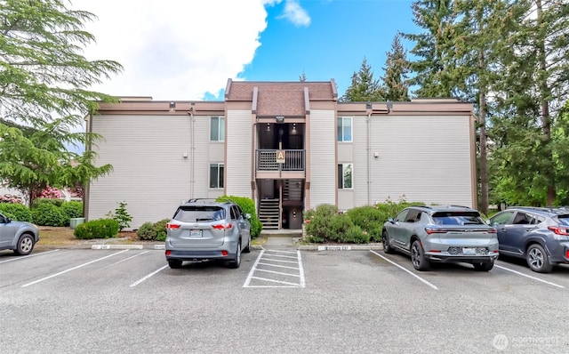 14650 NE 32nd St Unit A-13, Bellevue, WA 98007 - view of building exterior featuring uncovered parking
