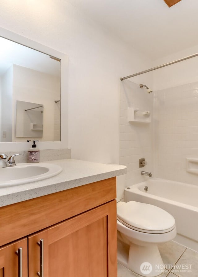 14650 NE 32nd St Unit A-13, Bellevue, WA 98007 - full bathroom with toilet, vanity,  shower combination, and tile patterned floors
