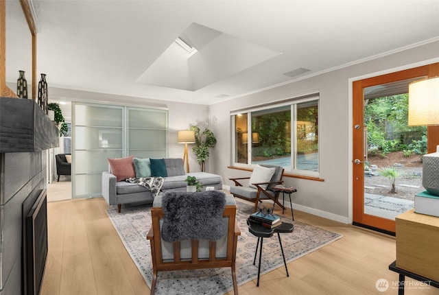 18906 32nd Ave NE, Lake Forest Park, WA 98155 - living area featuring light wood finished floors, baseboards, and crown molding