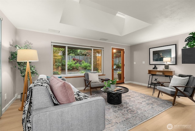 18906 32nd Ave NE, Lake Forest Park, WA 98155 - living room featuring wood finished floors, crown molding, and baseboards