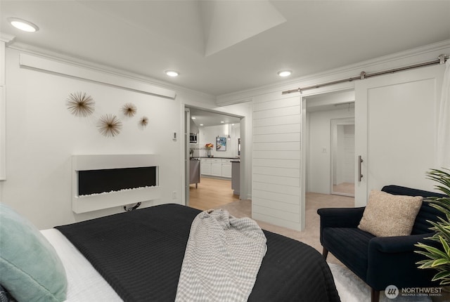 18906 32nd Ave NE, Lake Forest Park, WA 98155 - bedroom with ornamental molding, a barn door, recessed lighting, and light carpet