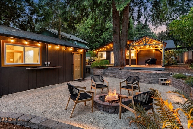 18906 32nd Ave NE, Lake Forest Park, WA 98155 - view of patio / terrace with a fire pit