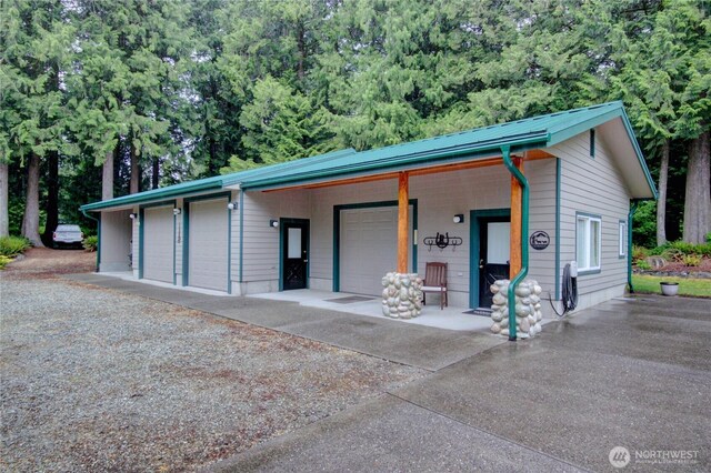 37938 Theo Ln, Concrete, WA 98237 - garage with covered porch