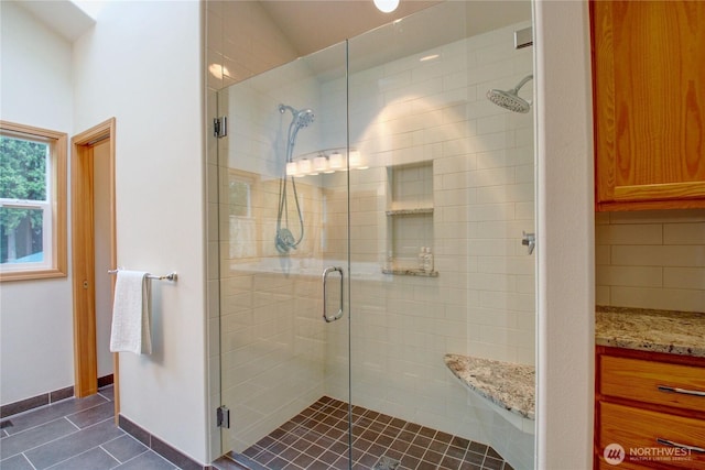 37938 Theo Ln, Concrete, WA 98237 - bathroom with tile patterned floors and a stall shower