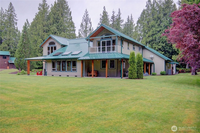 37938 Theo Ln, Concrete, WA 98237 - view of front of home featuring a front yard, metal roof, and a porch