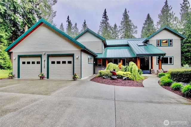 37938 Theo Ln, Concrete, WA 98237 - view of front of property with concrete driveway, a garage, and a porch