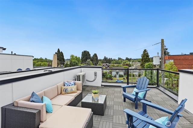 wooden deck with an outdoor hangout area
