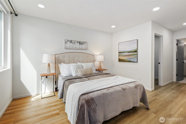 bedroom with light wood-type flooring, recessed lighting, and baseboards