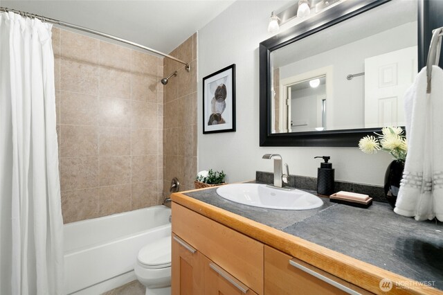 12044 96th Ave NE Unit 211, Kirkland, WA 98034 - full bath with shower / bath combo with shower curtain, toilet, and vanity
