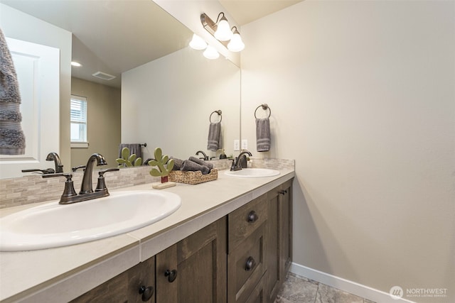 7135 S 13th St, Ridgefield, WA 98642 - bathroom featuring baseboards and double vanity