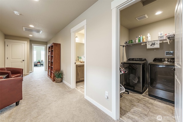 7135 S 13th St, Ridgefield, WA 98642 - laundry area with washer and dryer, baseboards, recessed lighting, and carpet