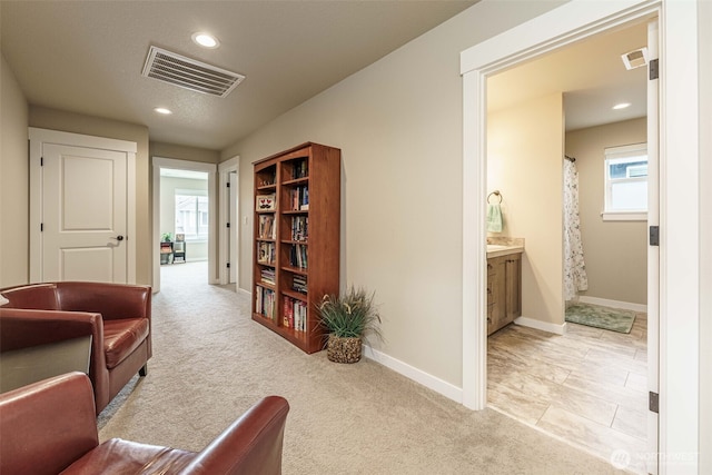 7135 S 13th St, Ridgefield, WA 98642 - living area featuring recessed lighting, light colored carpet, and baseboards