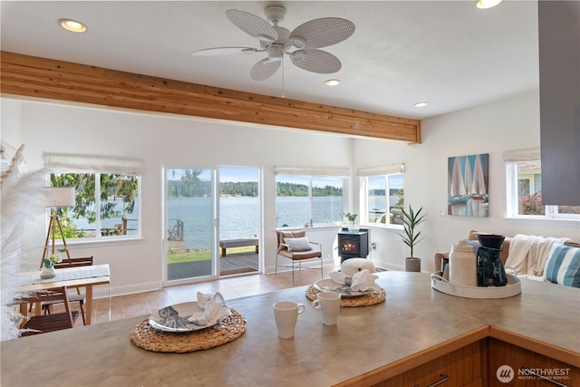 7610 E Grapeview Loop Rd, Allyn, WA 98524 - kitchen featuring healthy amount of natural light, recessed lighting, tile patterned flooring, beam ceiling, and a water view