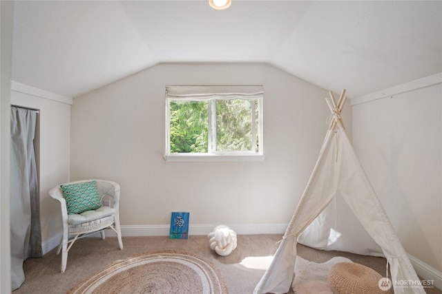7610 E Grapeview Loop Rd, Allyn, WA 98524 - living area featuring carpet, lofted ceiling, and baseboards