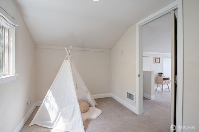 7610 E Grapeview Loop Rd, Allyn, WA 98524 - game room featuring vaulted ceiling, light carpet, and baseboards