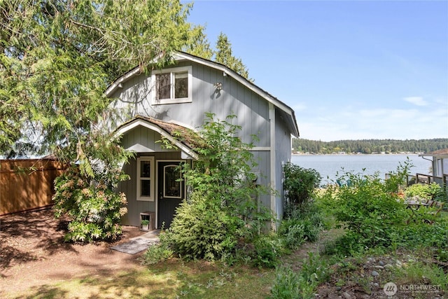 7610 E Grapeview Loop Rd, Allyn, WA 98524 - view of front of property featuring a water view and fence