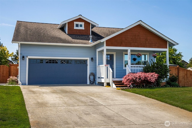 28540 74th Dr NW, Stanwood, WA 98292 - view of front of property featuring covered porch, roof with shingles, an attached garage, and driveway