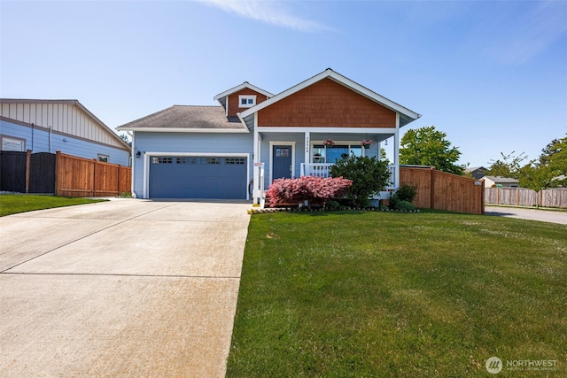 28540 74th Dr NW, Stanwood, WA 98292 - view of front of house featuring a garage, driveway, and a porch