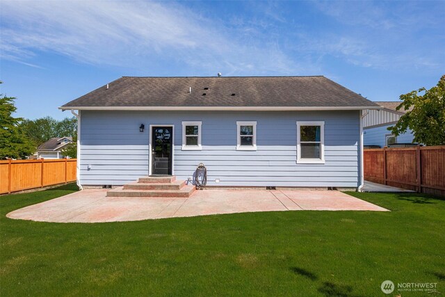 28540 74th Dr NW, Stanwood, WA 98292 - back of property featuring a patio area and roof with shingles