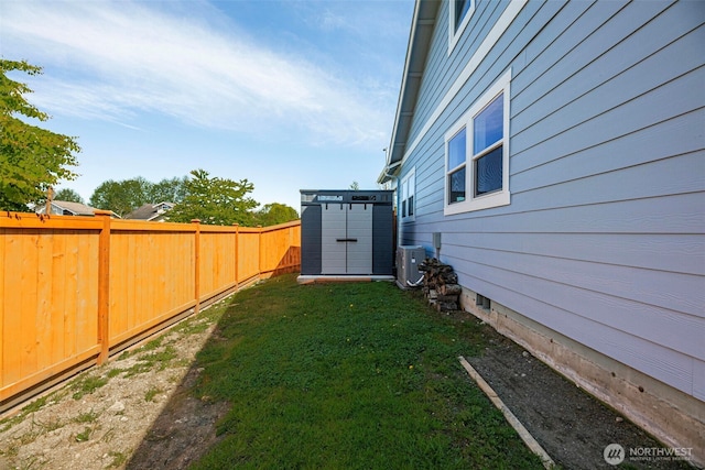 28540 74th Dr NW, Stanwood, WA 98292 - view of yard with central air condition unit, a storage unit, and an outdoor structure