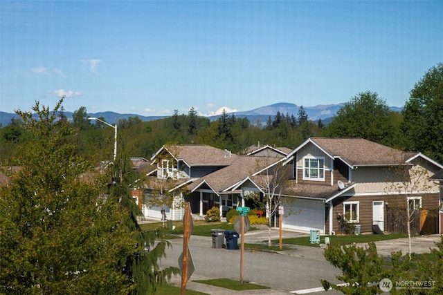 28540 74th Dr NW, Stanwood, WA 98292 - view of front facade featuring a mountain view and driveway