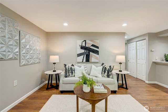 12724 NE 144th St Unit E-104, Kirkland, WA 98034 - living area featuring baseboards, wood finished floors, and recessed lighting