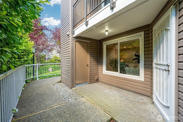 12724 NE 144th St Unit E-104, Kirkland, WA 98034 - view of patio with a balcony