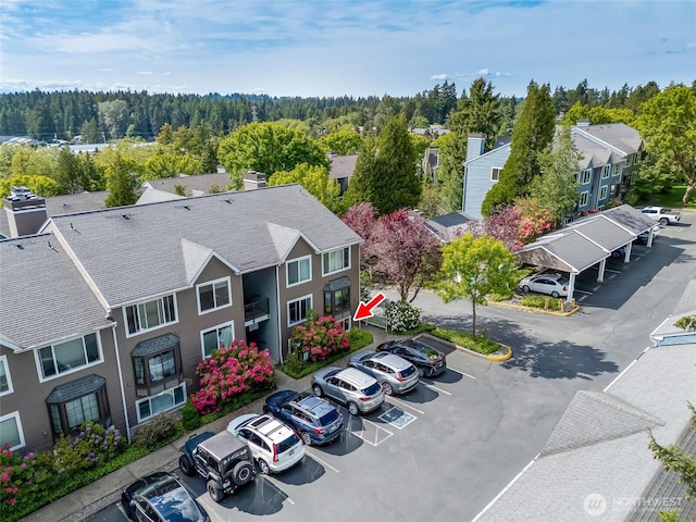 12724 NE 144th St Unit E-104, Kirkland, WA 98034 - aerial view of a heavily wooded area